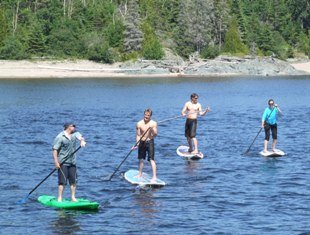 Stand Up Paddling at Naturally Superior Adventures