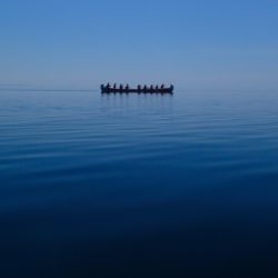 Voyageur canoe on a calm Lake Superior
