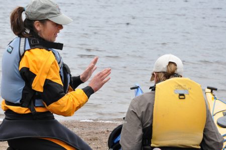 sea kayak Instructor teaching a student at naturally superior adventures
