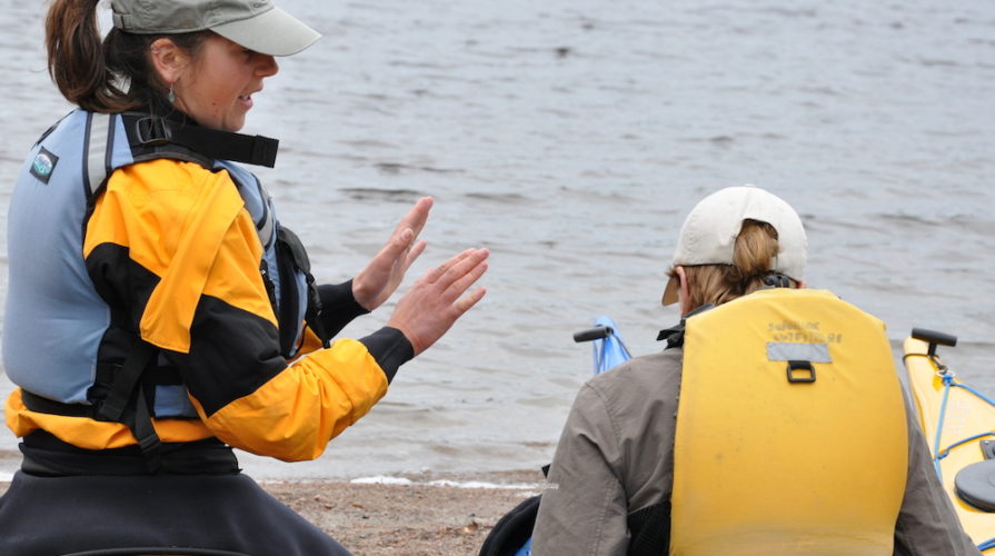 sea kayak Instructor teaching a student at naturally superior adventures